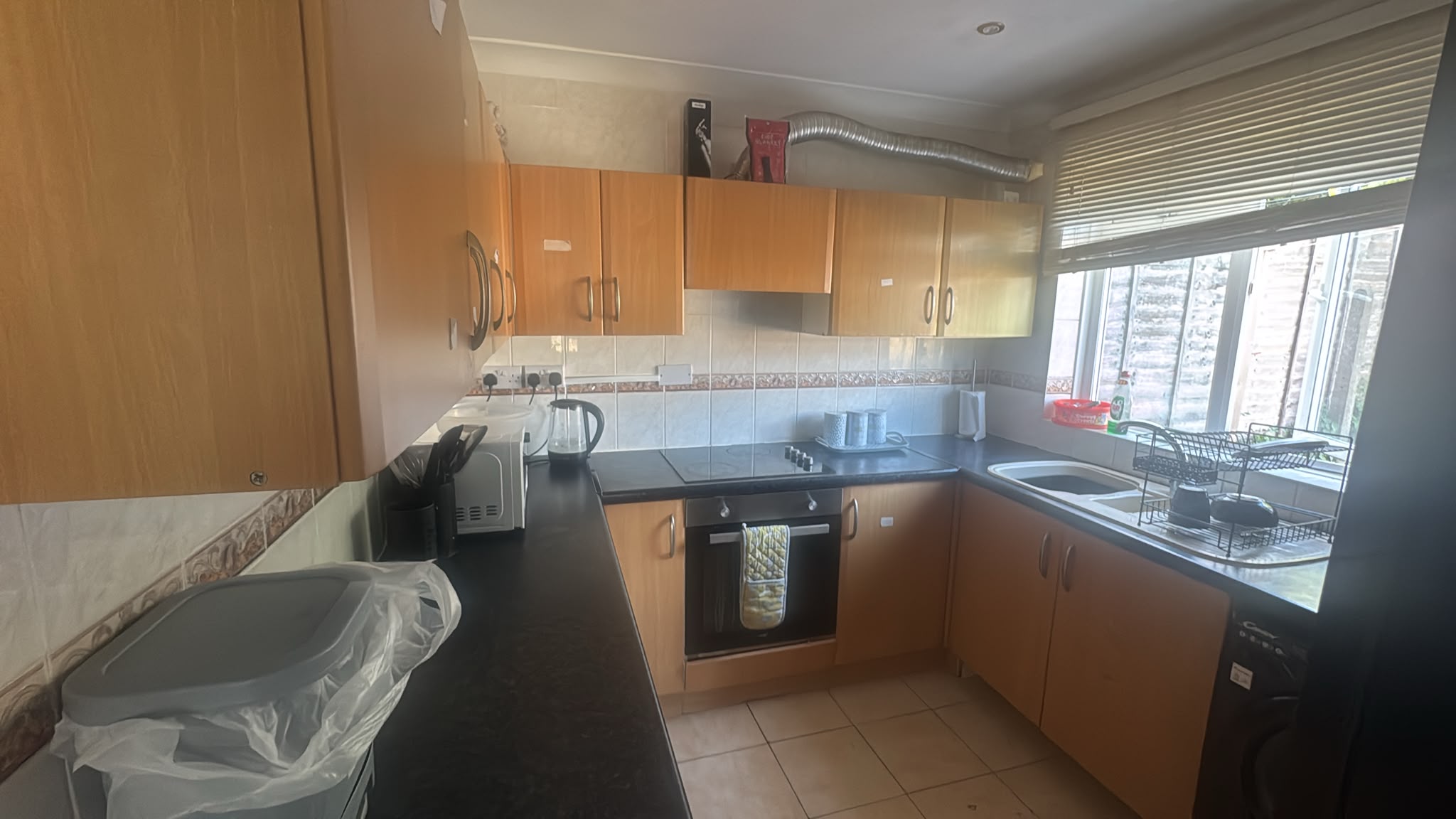 The fitted shared kitchen at Bellingham Crescent supported living home