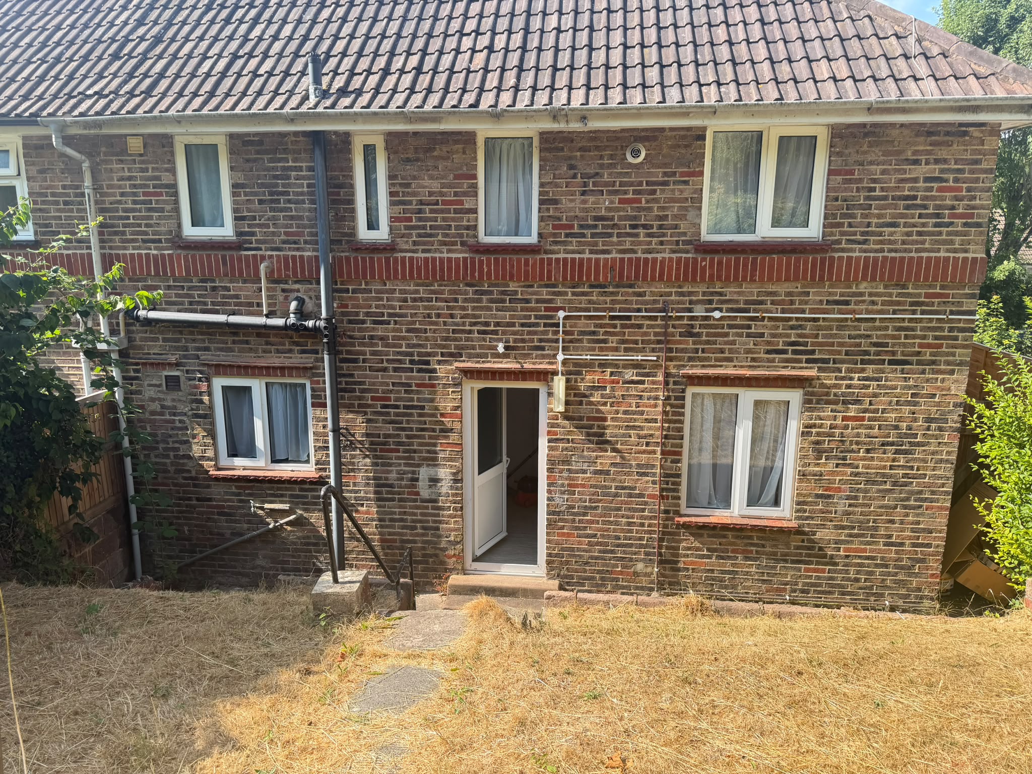 The private rear garden at Manton Road supported living home