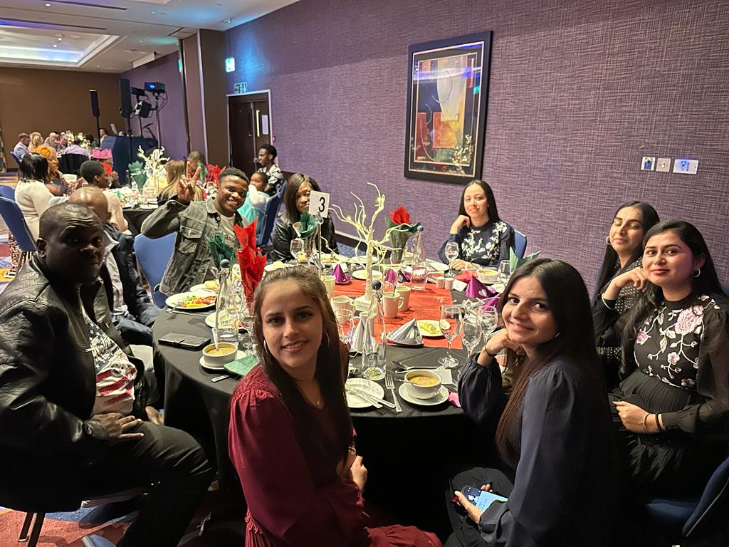 The Evergood Medicals team celebrating together at a company dinner